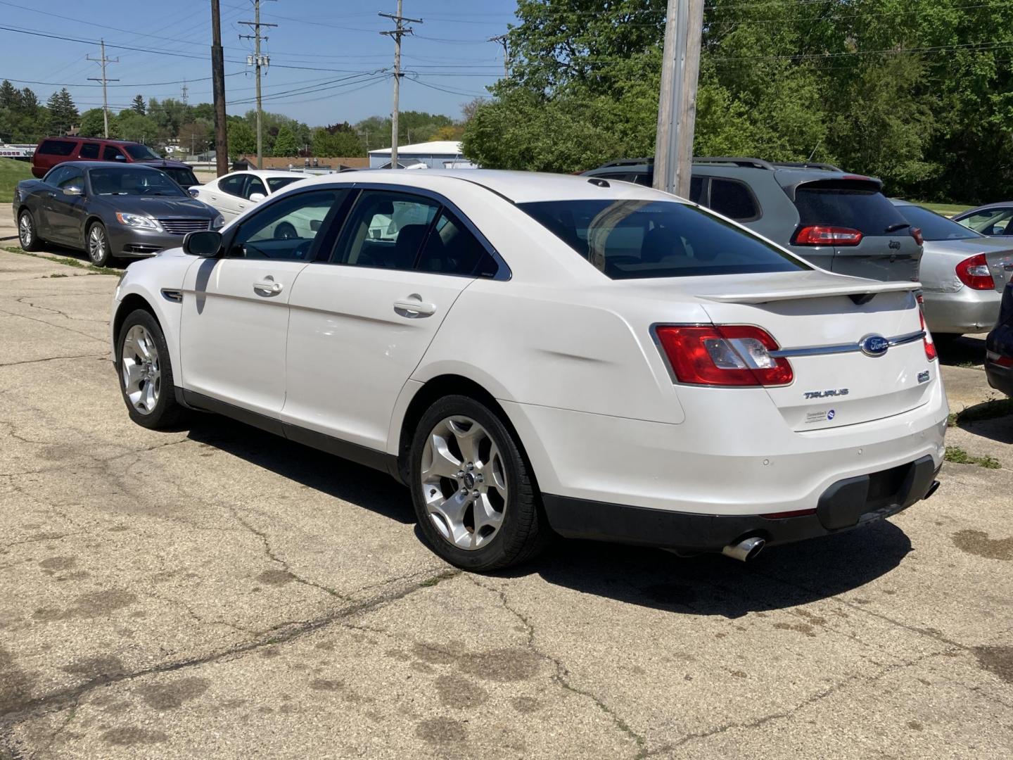 2011 White Platinum Met Ford Taurus SHO FWD (1FAHP2KT3BG) with an 3.5L V6 DOHC 24V engine, 6-Speed Automatic transmission, located at 1800 South Ihm Blvd, Freeport, IL, 61032, (815) 232-5543, 42.278645, -89.607994 - Taurus SHO 4D Sedan AWD - Photo#1