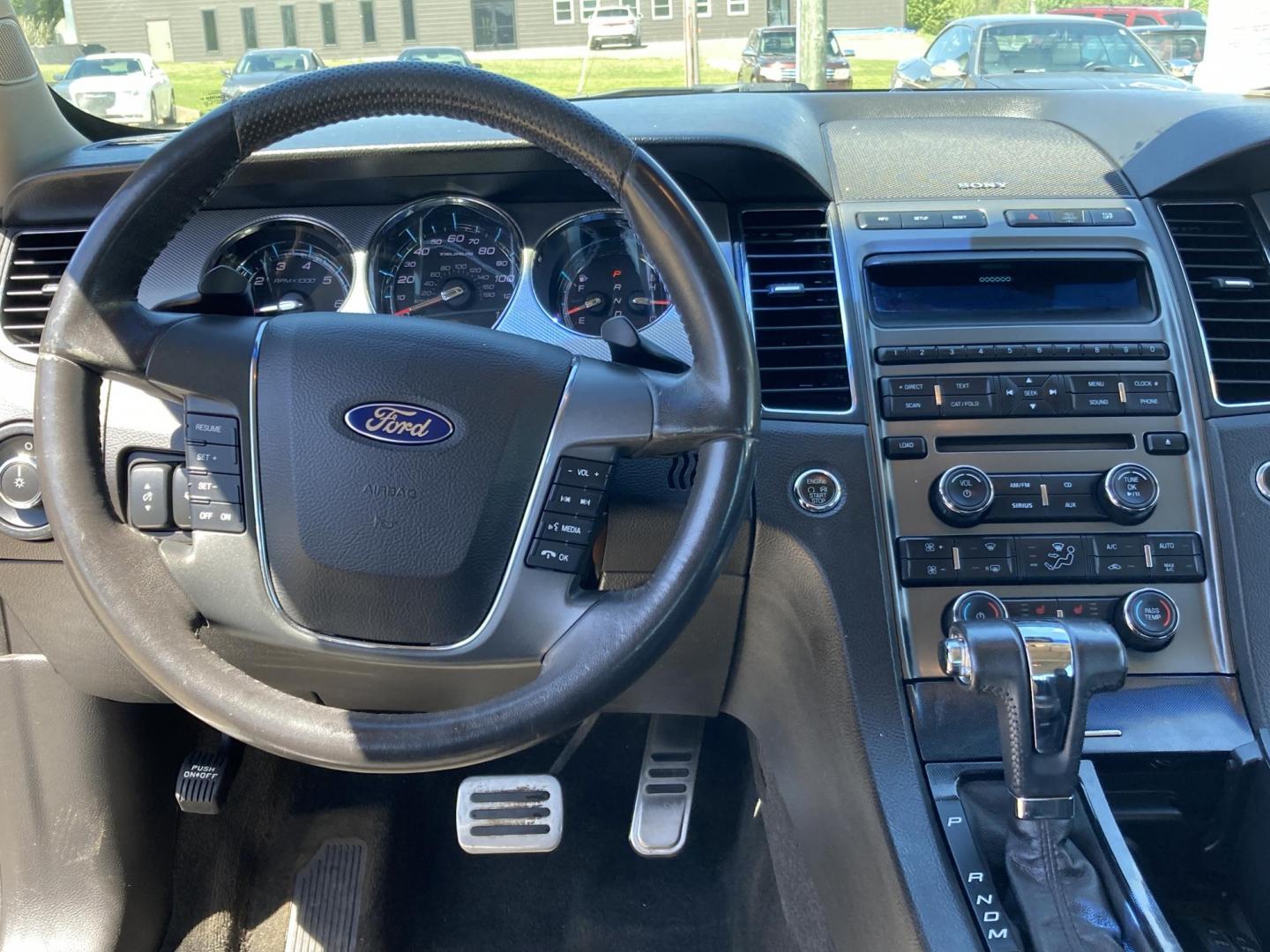 2011 White Platinum Met Ford Taurus SHO FWD (1FAHP2KT3BG) with an 3.5L V6 DOHC 24V engine, 6-Speed Automatic transmission, located at 1800 South Ihm Blvd, Freeport, IL, 61032, (815) 232-5543, 42.278645, -89.607994 - Taurus SHO 4D Sedan AWD - Photo#4