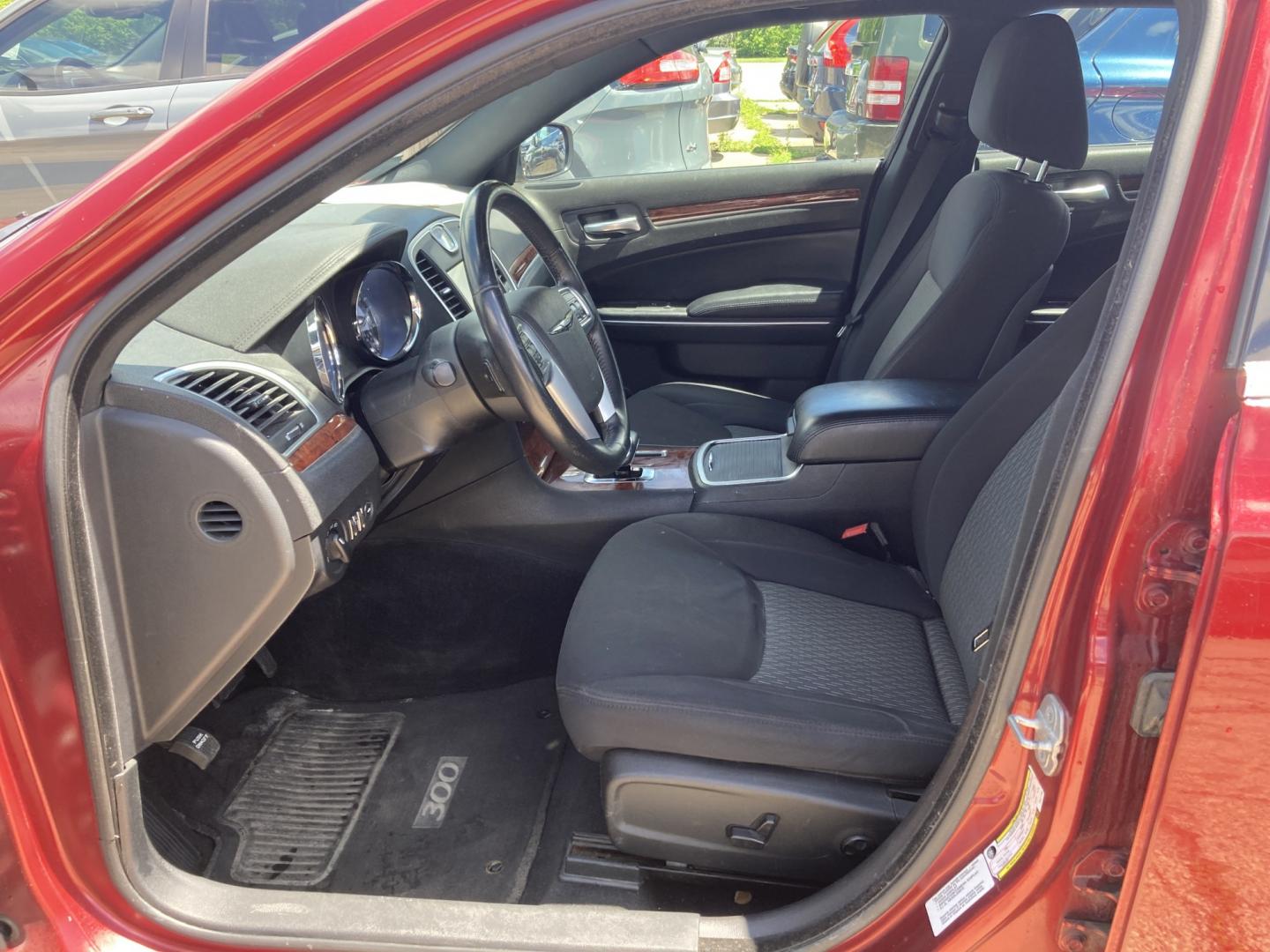 2012 Medium Red Met Chrysler 300 Base (2C3CCAAG6CH) with an 3.6L V6 SOHC 24V engine, 5-Speed Automatic transmission, located at 1800 South Ihm Blvd, Freeport, IL, 61032, (815) 232-5543, 42.278645, -89.607994 - 300 Base 4D Sedan- Photo#4
