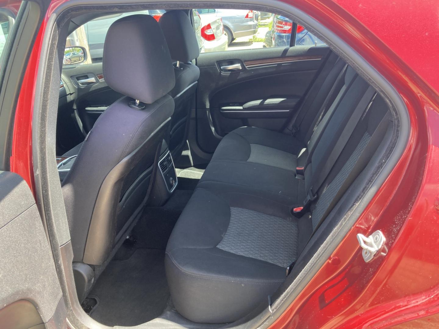 2012 Medium Red Met Chrysler 300 Base (2C3CCAAG6CH) with an 3.6L V6 SOHC 24V engine, 5-Speed Automatic transmission, located at 1800 South Ihm Blvd, Freeport, IL, 61032, (815) 232-5543, 42.278645, -89.607994 - 300 Base 4D Sedan- Photo#7