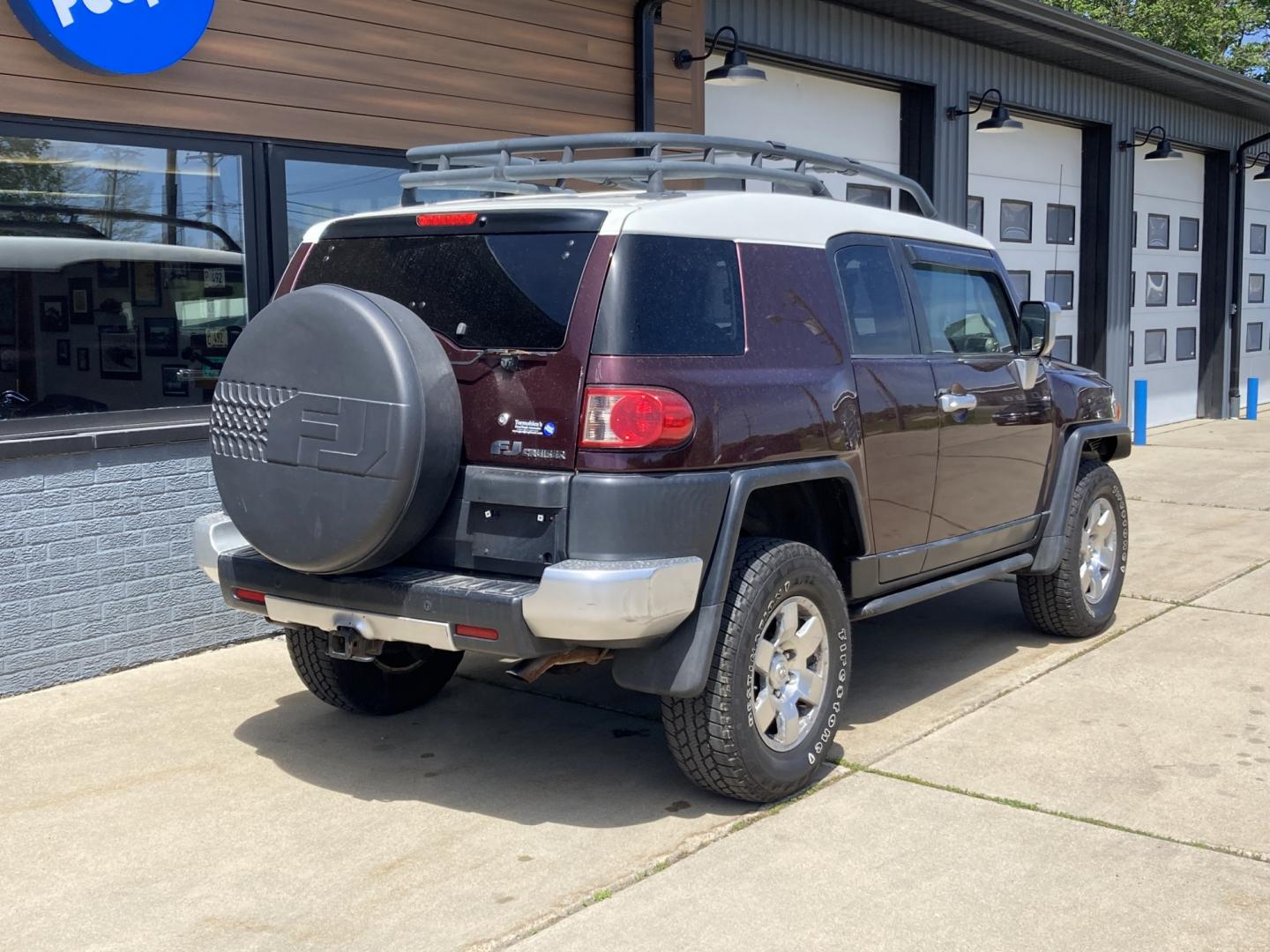 2007 Black Cherry Pearlcoat Toyota FJ Cruiser 4WD AT (JTEBU11FX70) with an 3.4L V6 DOHC 24V engine, 5-Speed Automatic Overdrive transmission, located at 1800 South Ihm Blvd, Freeport, IL, 61032, (815) 232-5543, 42.278645, -89.607994 - FJ Cruiser 4D SUV 4WD- Photo#1