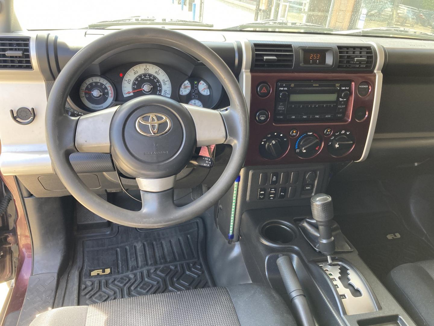 2007 Black Cherry Pearlcoat Toyota FJ Cruiser 4WD AT (JTEBU11FX70) with an 3.4L V6 DOHC 24V engine, 5-Speed Automatic Overdrive transmission, located at 1800 South Ihm Blvd, Freeport, IL, 61032, (815) 232-5543, 42.278645, -89.607994 - FJ Cruiser 4D SUV 4WD- Photo#5