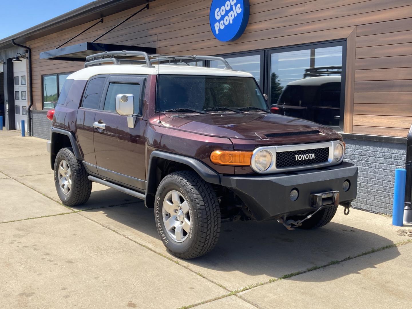 2007 Black Cherry Pearlcoat Toyota FJ Cruiser 4WD AT (JTEBU11FX70) with an 3.4L V6 DOHC 24V engine, 5-Speed Automatic Overdrive transmission, located at 1800 South Ihm Blvd, Freeport, IL, 61032, (815) 232-5543, 42.278645, -89.607994 - FJ Cruiser 4D SUV 4WD- Photo#0