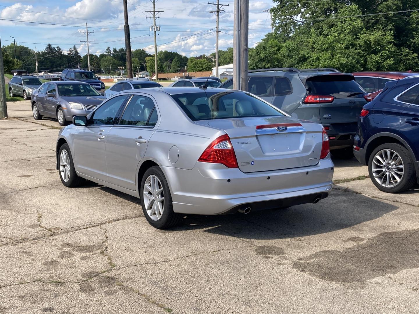 2012 Bright Silver Ford Fusion SEL (3FAHP0JG2CR) with an 3.0L V6 DOHC 24V engine, located at 1800 South Ihm Blvd, Freeport, IL, 61032, (815) 232-5543, 42.278645, -89.607994 - Fusion SEL 4D Sedan- Photo#2
