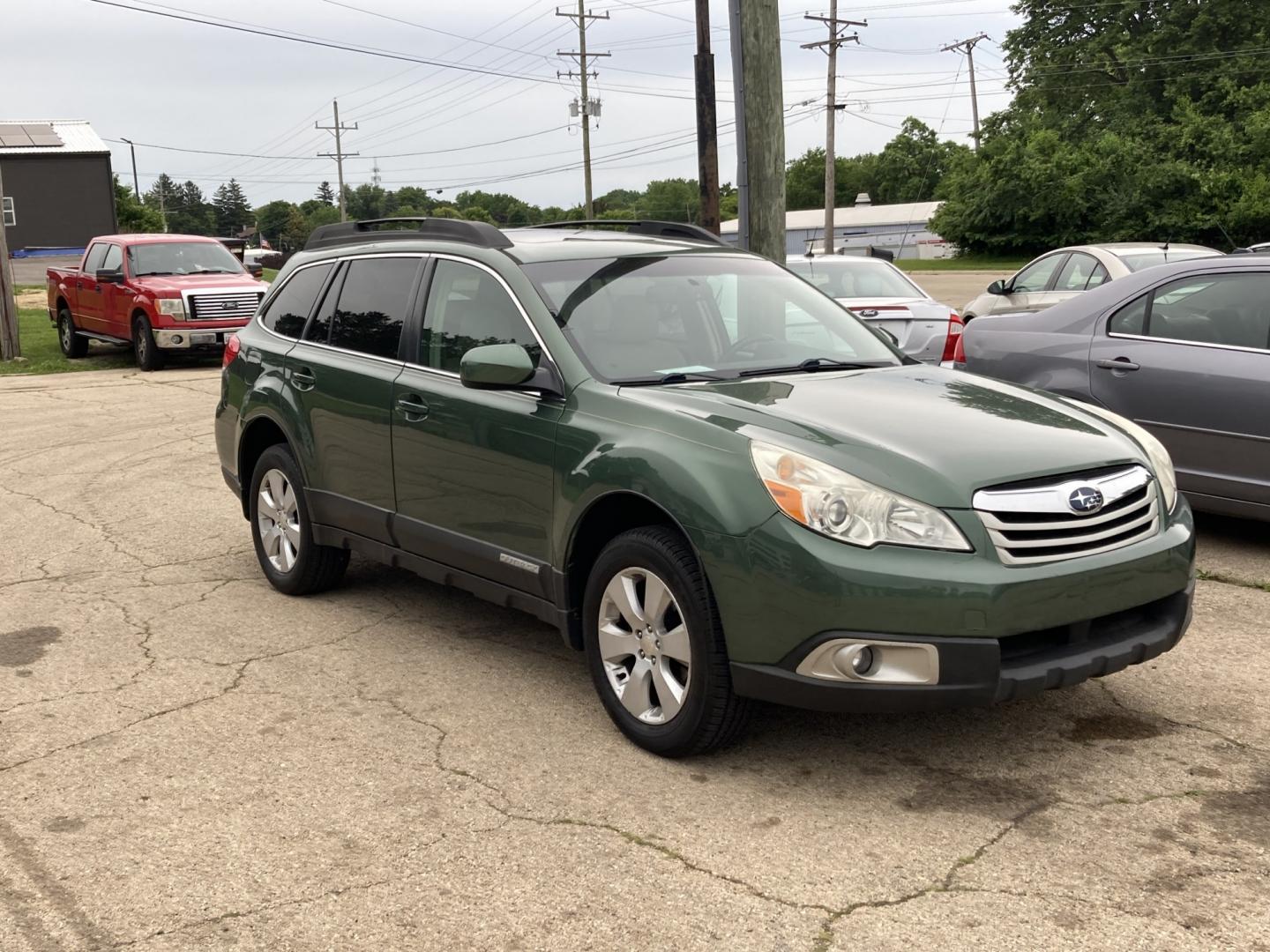 2010 Cypress Green m Subaru Outback 2.5i Premium (4S4BRCGC7A3) with an 2.5L H4 DOHC 16V engine, Continuously Variable Transmisson transmission, located at 1800 South Ihm Blvd, Freeport, IL, 61032, (815) 232-5543, 42.278645, -89.607994 - Outback Premium 4D Wagon- Photo#0