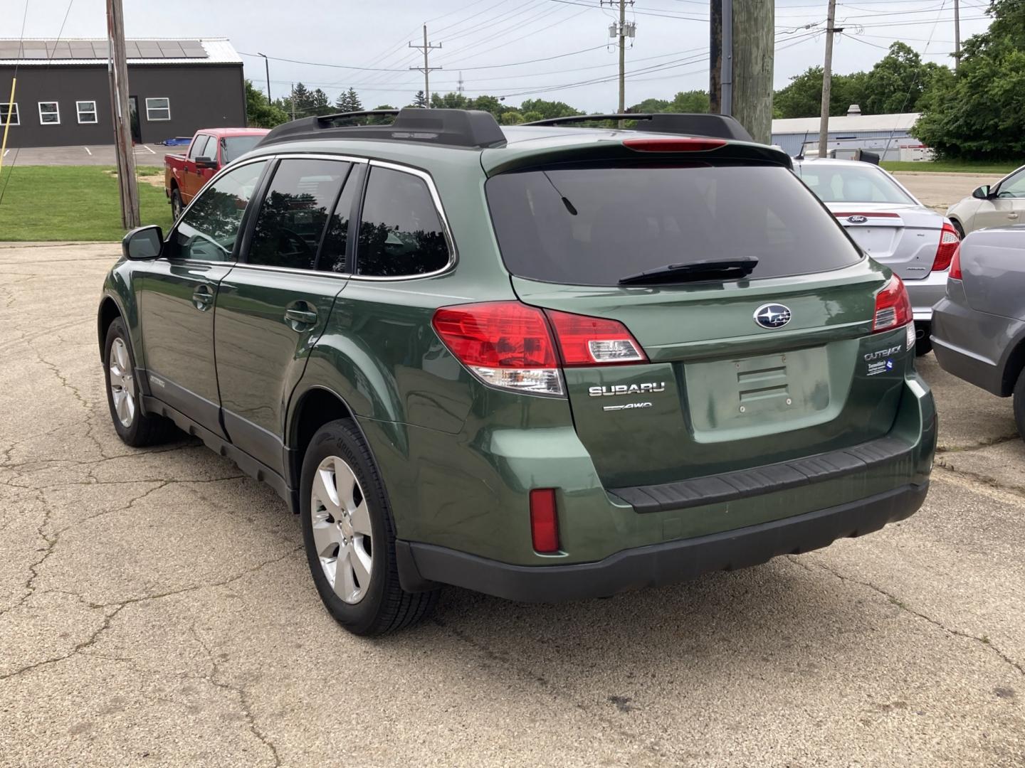2010 Cypress Green m Subaru Outback 2.5i Premium (4S4BRCGC7A3) with an 2.5L H4 DOHC 16V engine, Continuously Variable Transmisson transmission, located at 1800 South Ihm Blvd, Freeport, IL, 61032, (815) 232-5543, 42.278645, -89.607994 - Outback Premium 4D Wagon- Photo#2